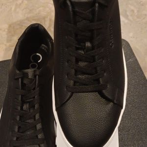 Black size 12 Calvin Klein sneakers